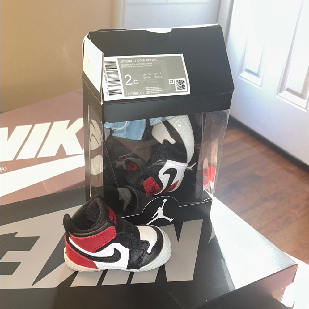Nike Kids Black, White, and Red Sneakers